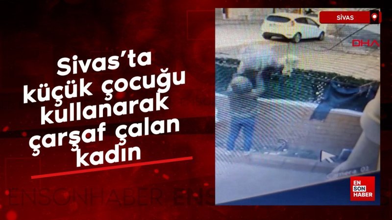 sivasta kucuk cocugu kullanarak carsaf calan kadin 6FFpaYvA