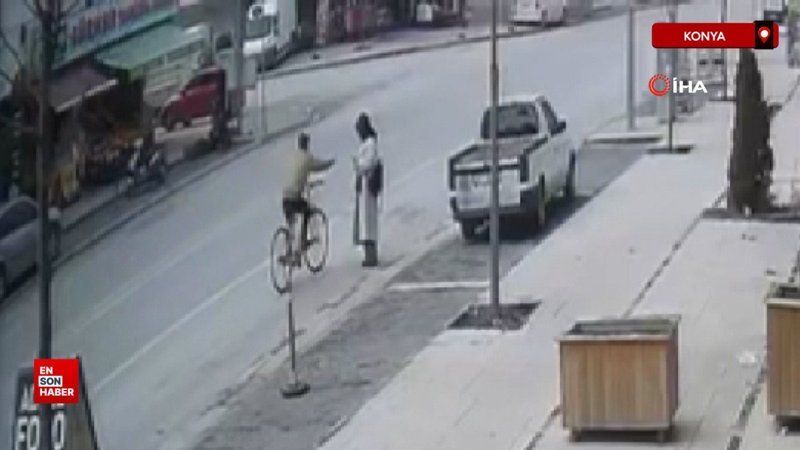 konyada kadinin elindeki telefonu calan bisikletli kapkacci lDVShq9A