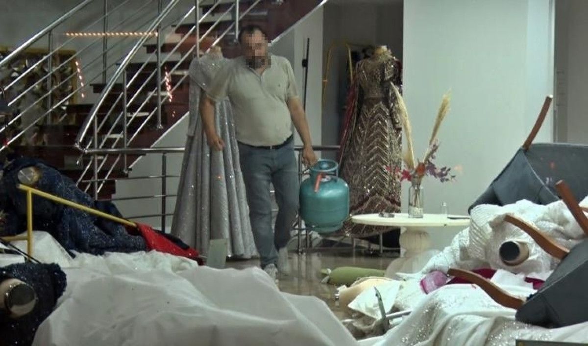 antalyada esinin kendisinden habersiz sattigi gelinlikciyi yakmaya calisti 2