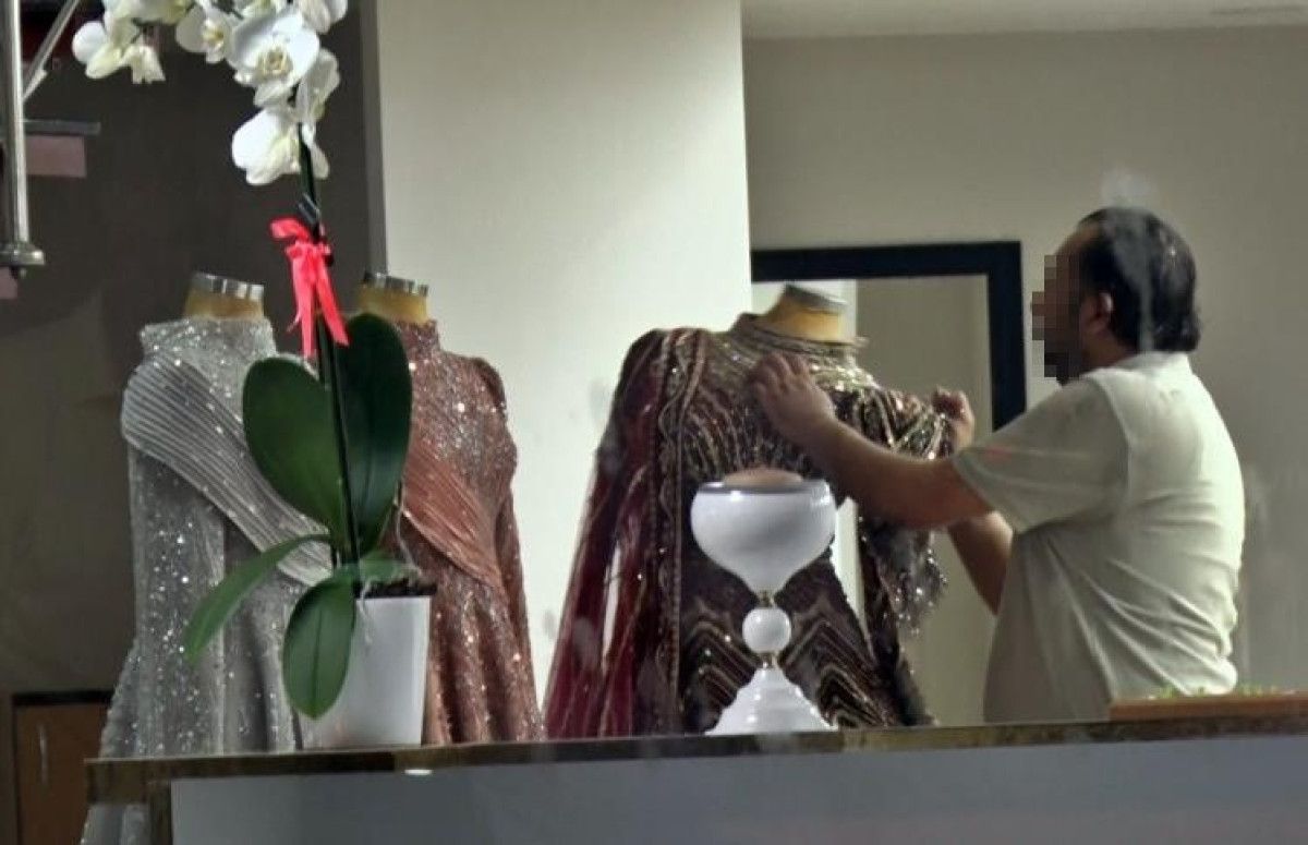 antalyada esinin kendisinden habersiz sattigi gelinlikciyi yakmaya calisti 3 K9Rj8sMR