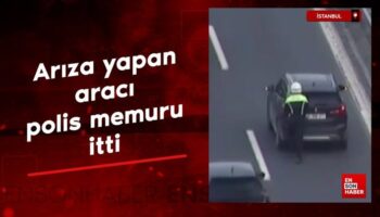 istanbulda koprude ariza yapan araci polis memurunun itmesi guvenlik kamerasinda 67OyyPCK