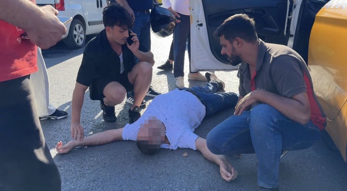 istanbulda bayginlik geciren taksicinin yardimina vatandas kostu 1 5vu52jID