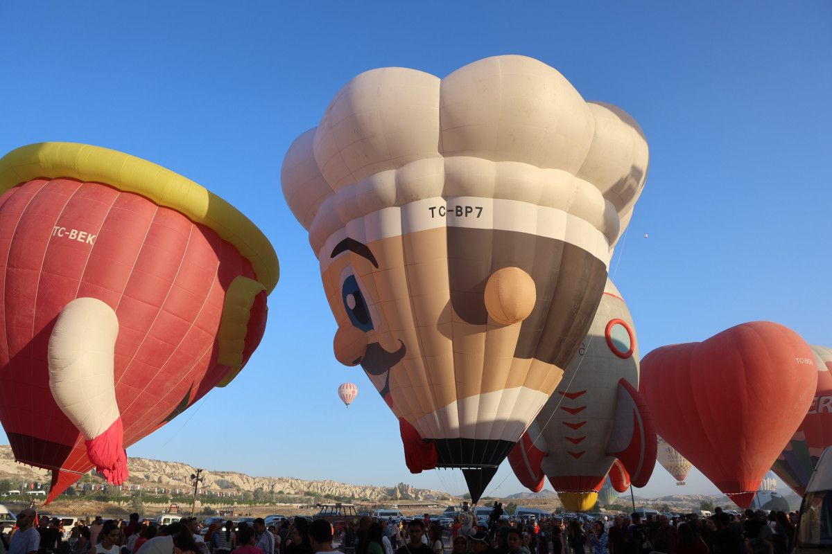 Nevşehir'de Balon Festivali başladı: 27 ülkeden 38 balon gökyüzünü süsledi 4 nevsehirde balon festivali basladi 27 ulkeden 38 balon gokyuzunu susledi 3 GHZZIwQk