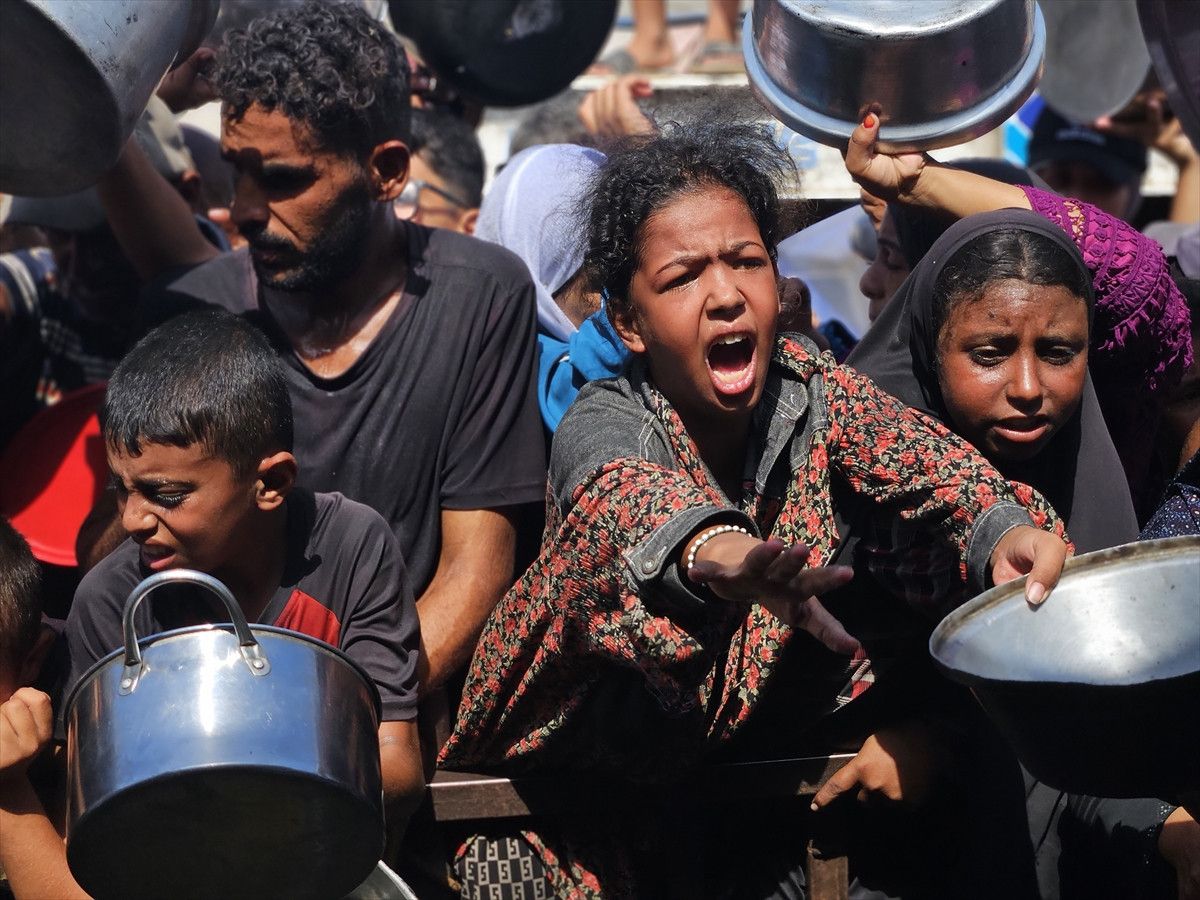 gazzede aclikla mucadele eden filistinlilere sicak yemek dagitildi 4 Q2HtC18c